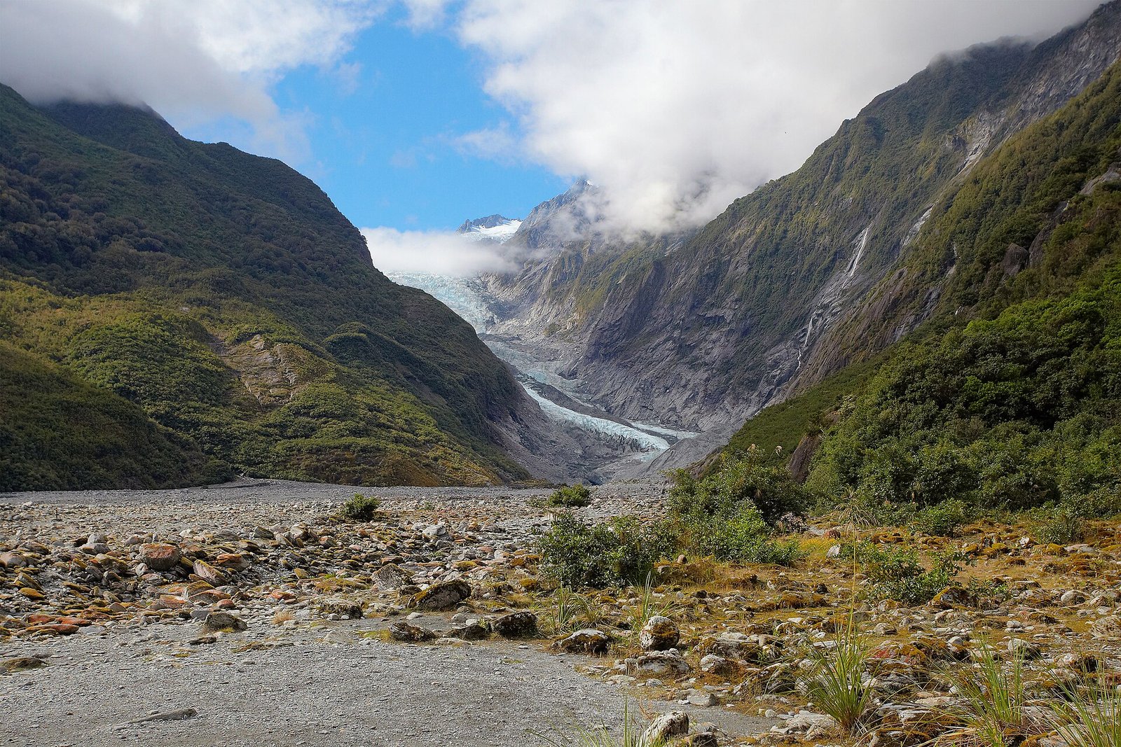 Franz Josef Glacier flowing between mountains on the West Coast of New Zealand