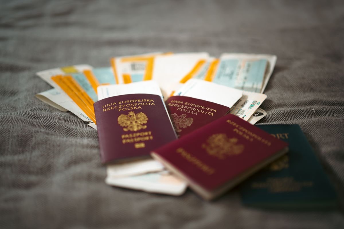 Passports and travel tickets laid out on a table while planning a trip