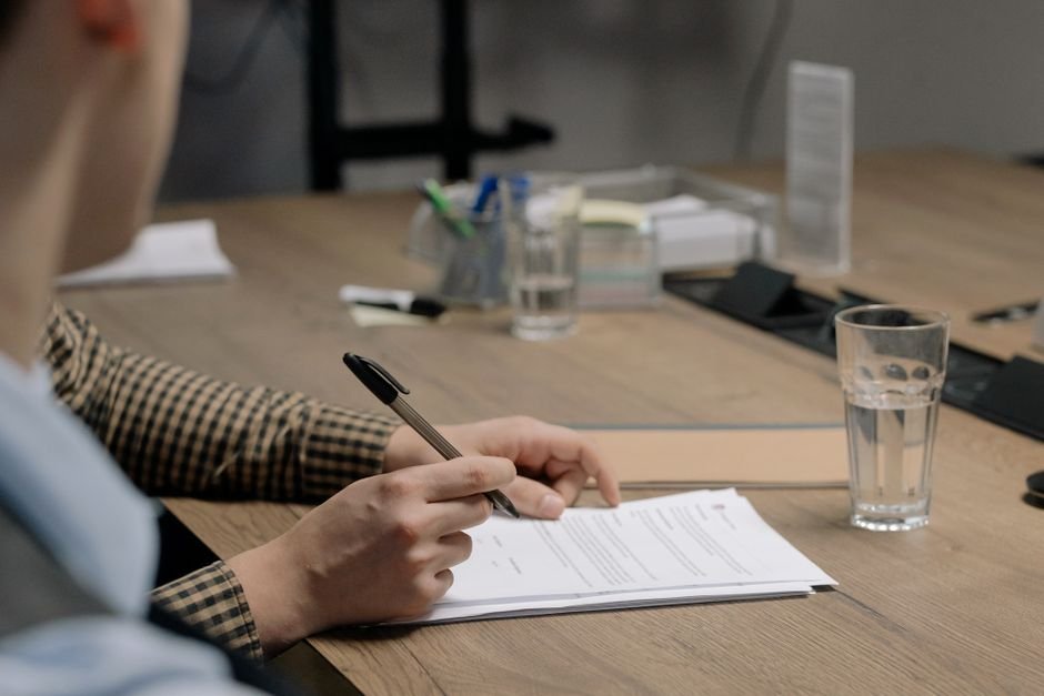 Affiliate disclosure agreement being reviewed and signed
