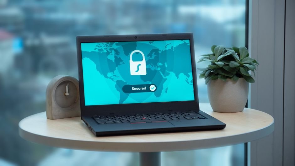 Laptop showing a data security lock icon, representing our privacy policy commitments